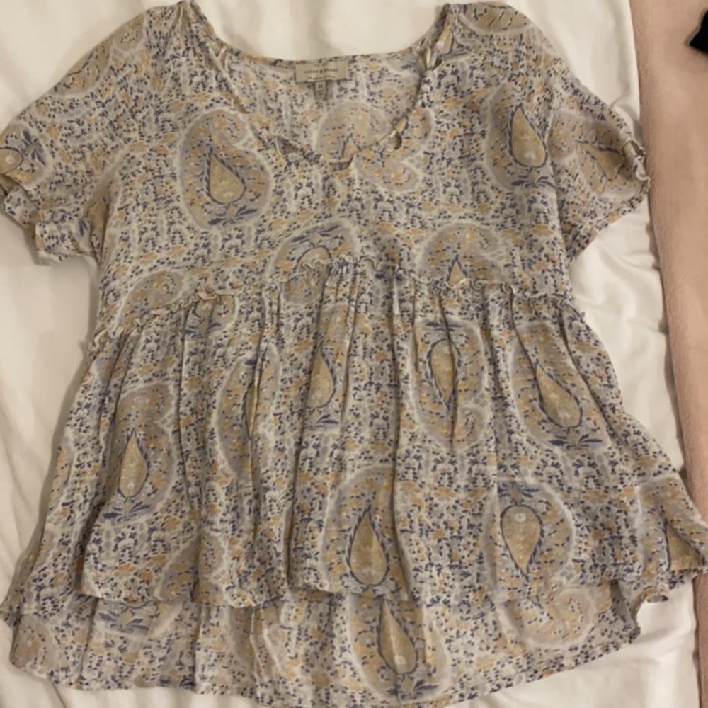 Lucky brand size M top. Worsen a few times. Great condition